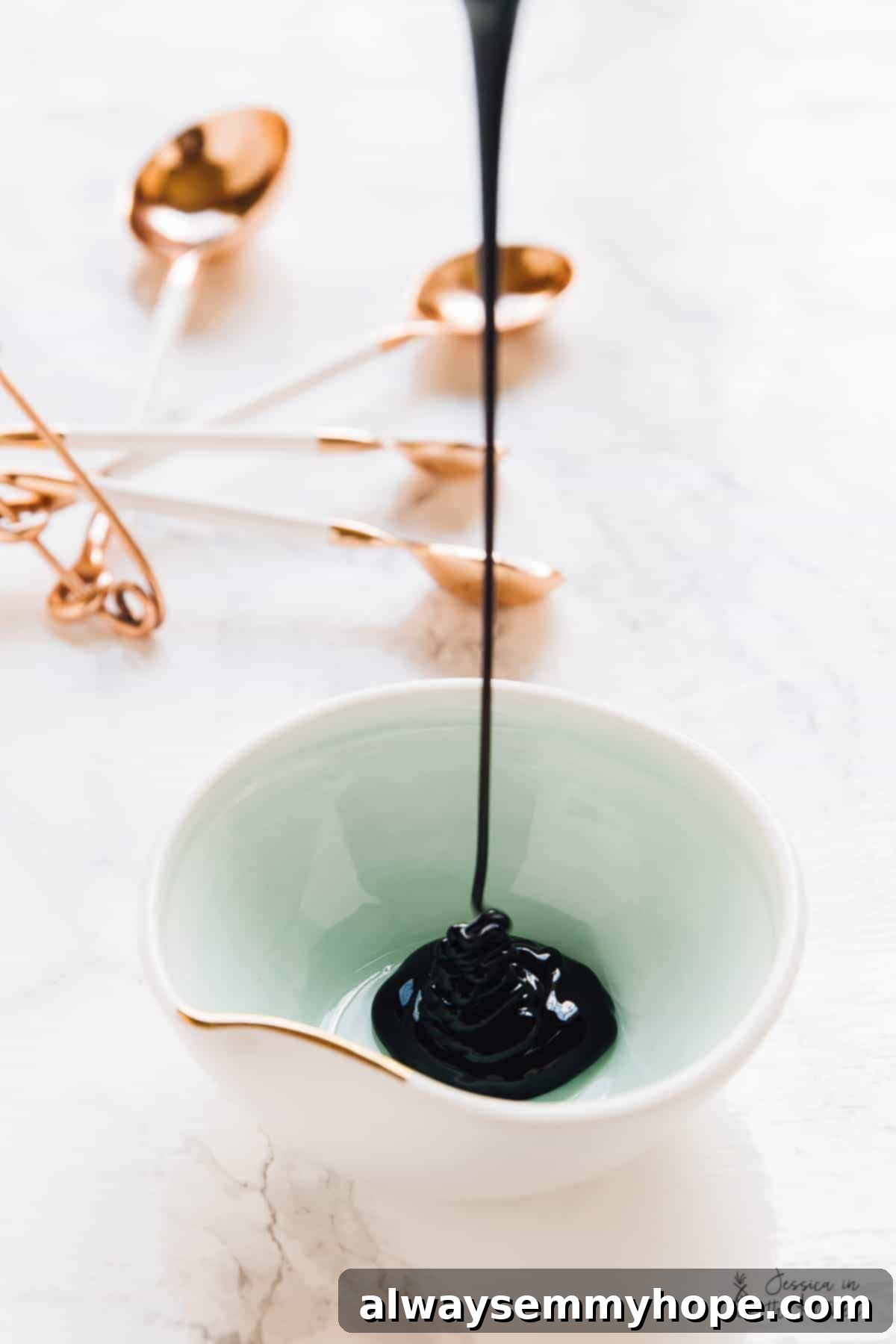 Behind the Plates: A Day with Full-Time Food Blogger Jessica 7 Drizzling sauce into a white bowl.