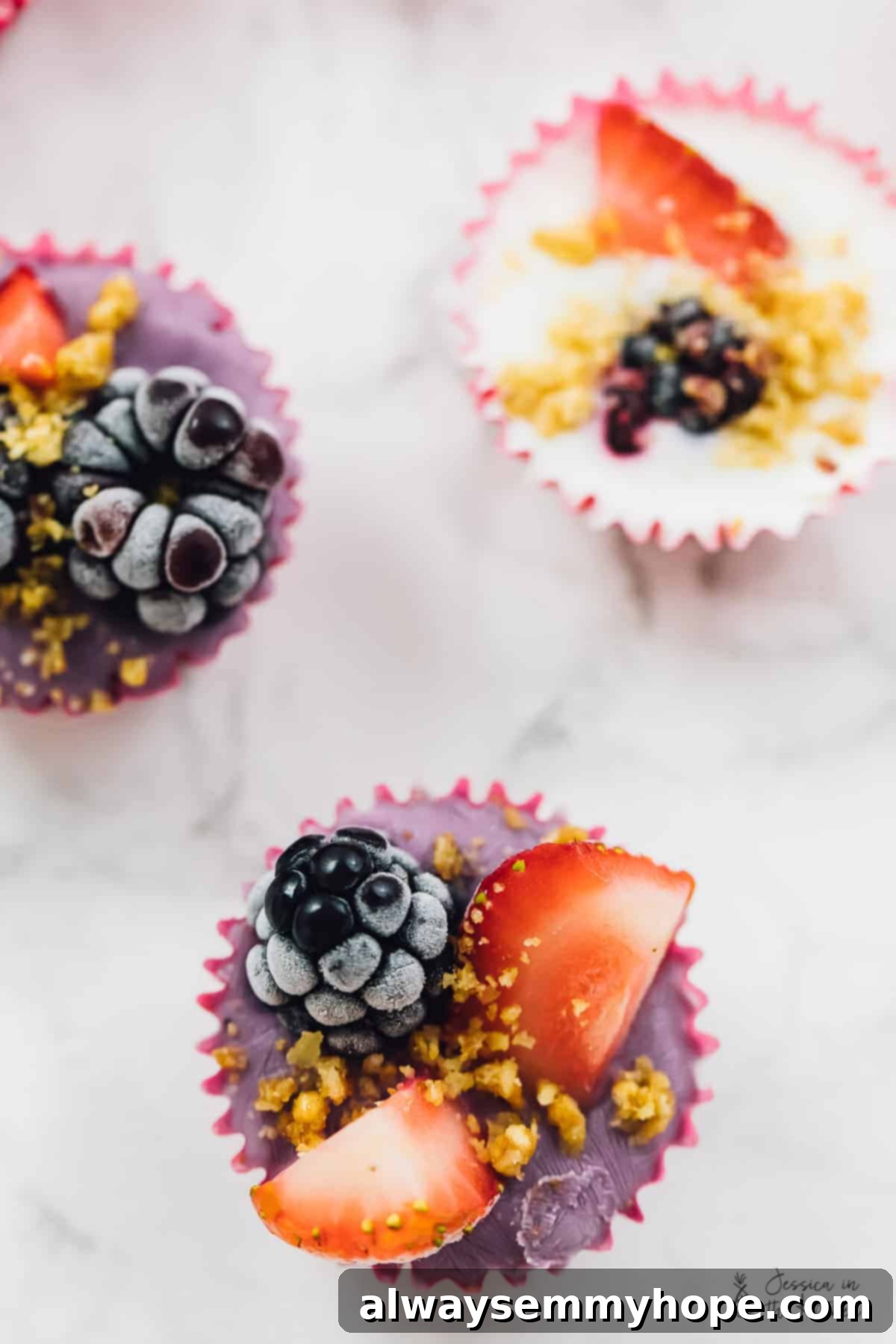 Easy 3-Ingredient Frozen Yogurt Granola Bites 4 Overhead view of three frozen yogurt granola cups.