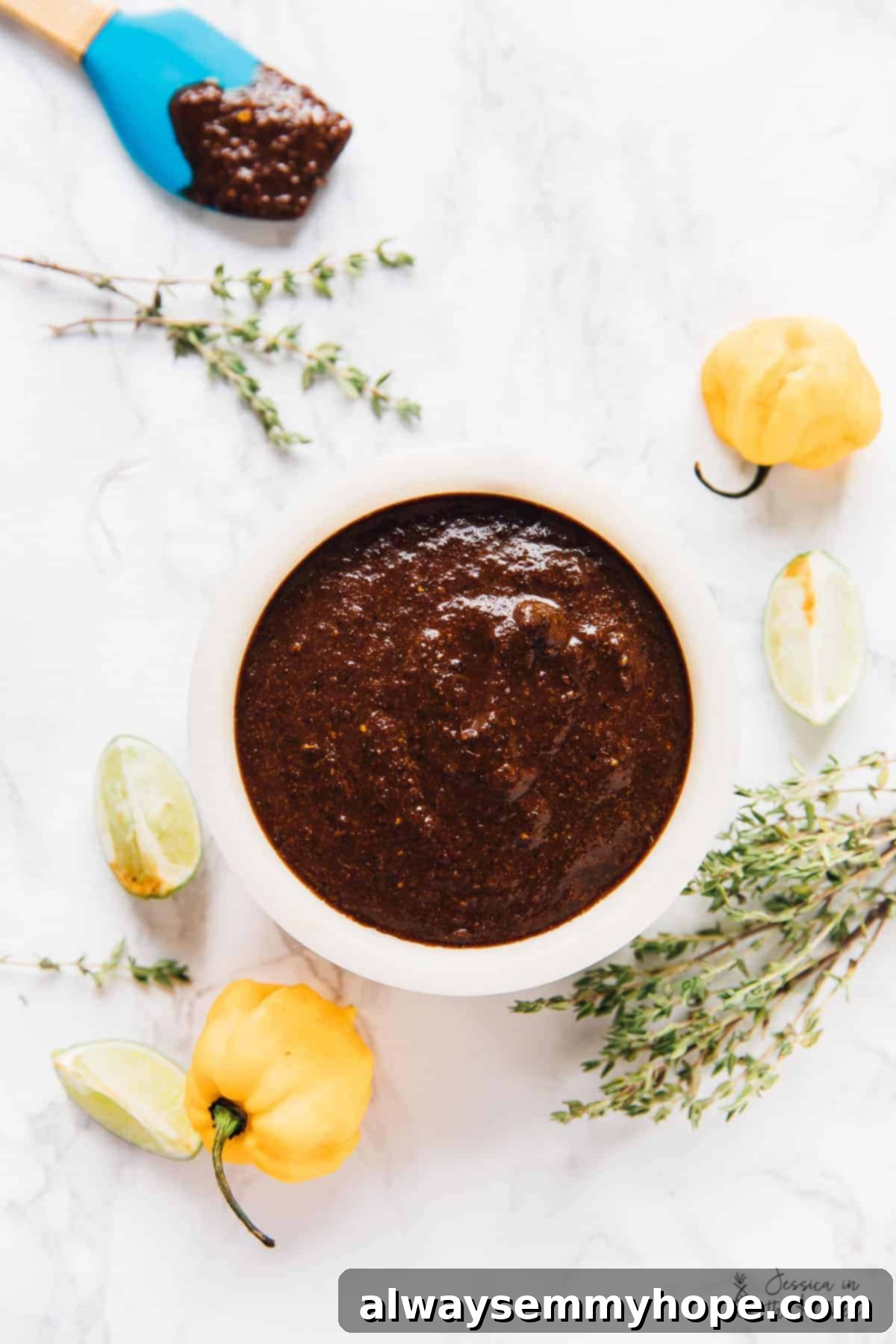 Easy Homemade Jamaican Jerk Sauce 5 Overhead shot of rich, dark Jamaica Jerk Sauce in a white bowl, ready to be served or used.