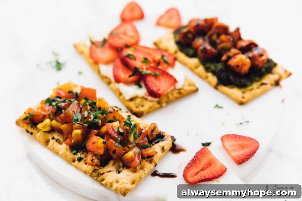 3 Quick and Easy Summer Appetizers With Video 5 Three distinct crispbread appetizers, each with unique toppings, artfully arranged on a white serving plate.