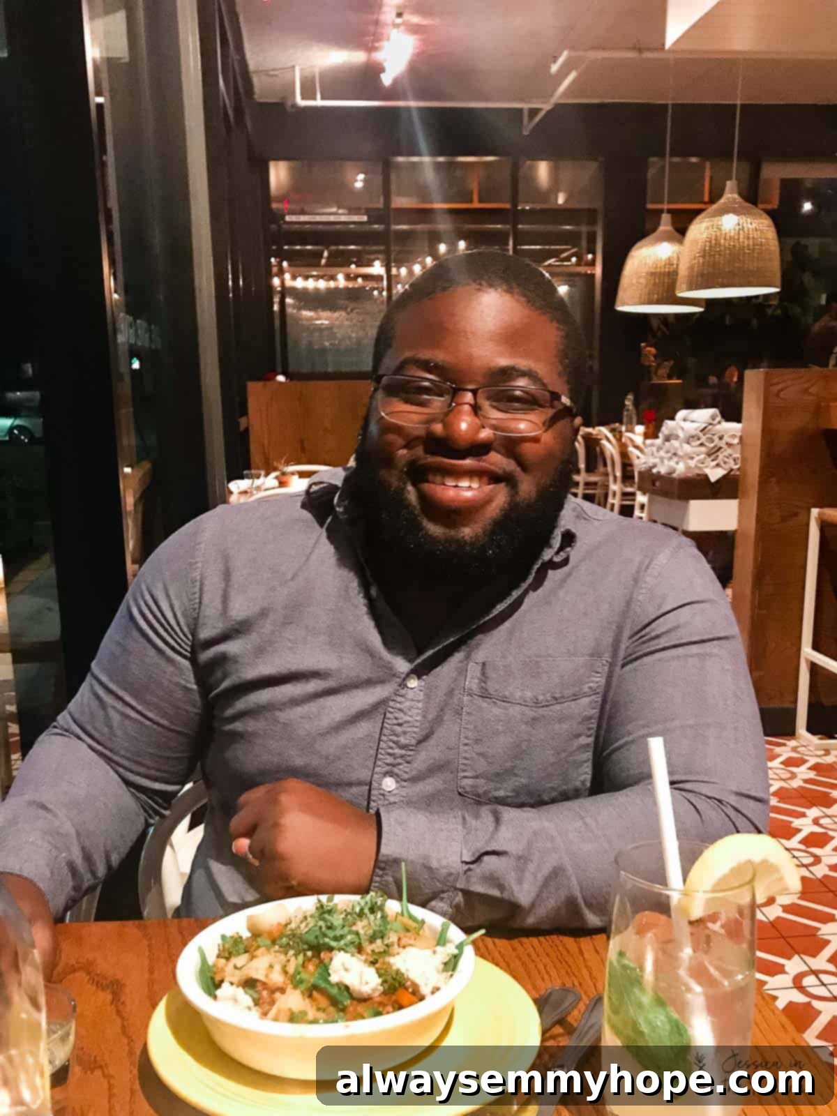 My Month as a Vegetarian: Unexpected Lessons 3 Gavin in a grey shirt, sat in a restaurant, smiling to camera.