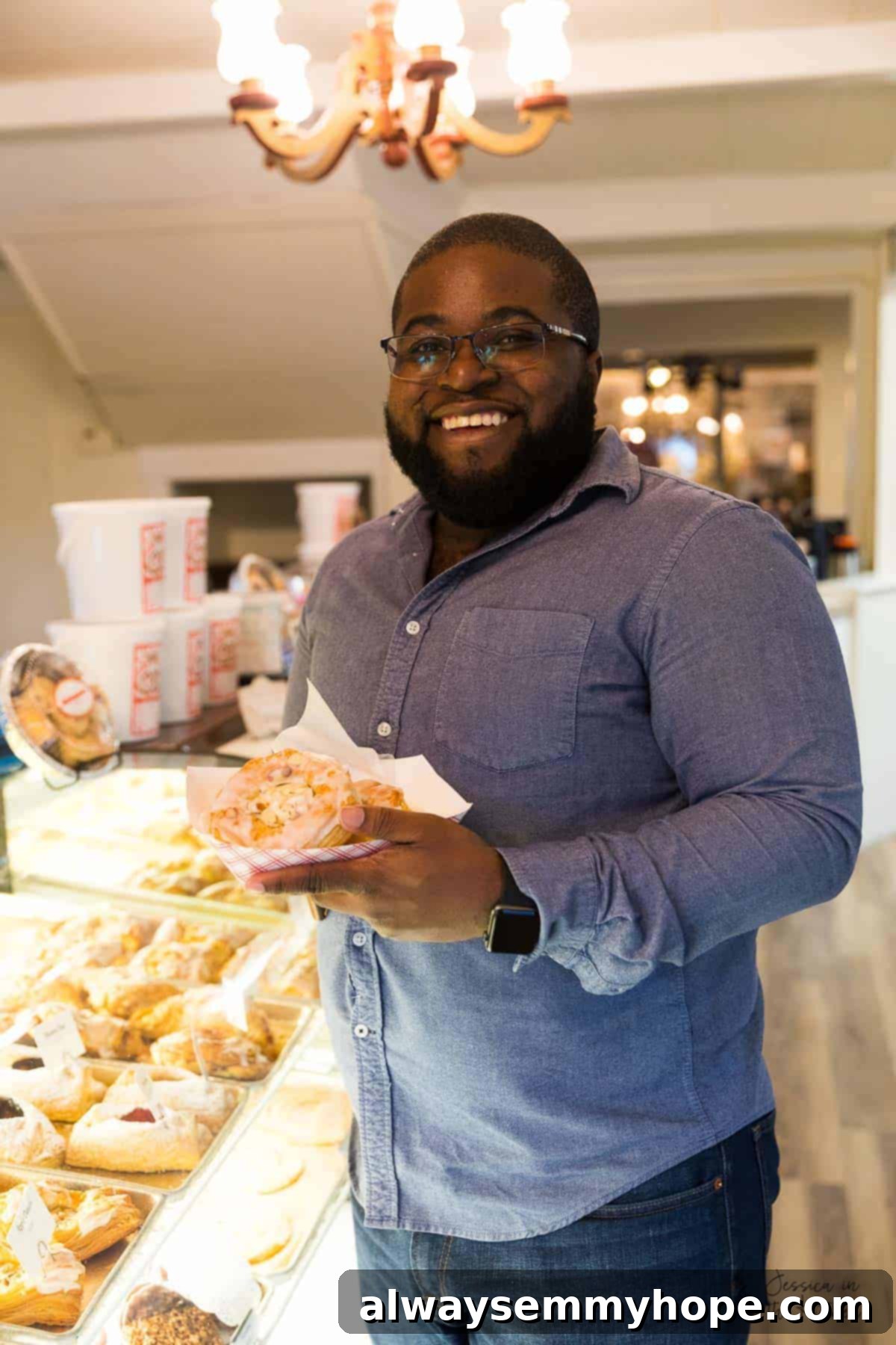 My Month as a Vegetarian: Unexpected Lessons 5 Gavin holding some pastries, smiling.