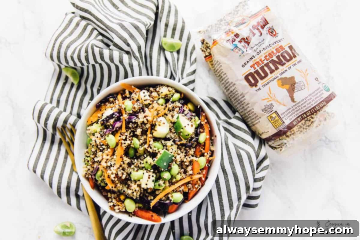 Speedy Sesame Ginger Quinoa Salad 5 Bowl of Asian quinoa salad set next to bag of tri-color quinoa, ready for serving