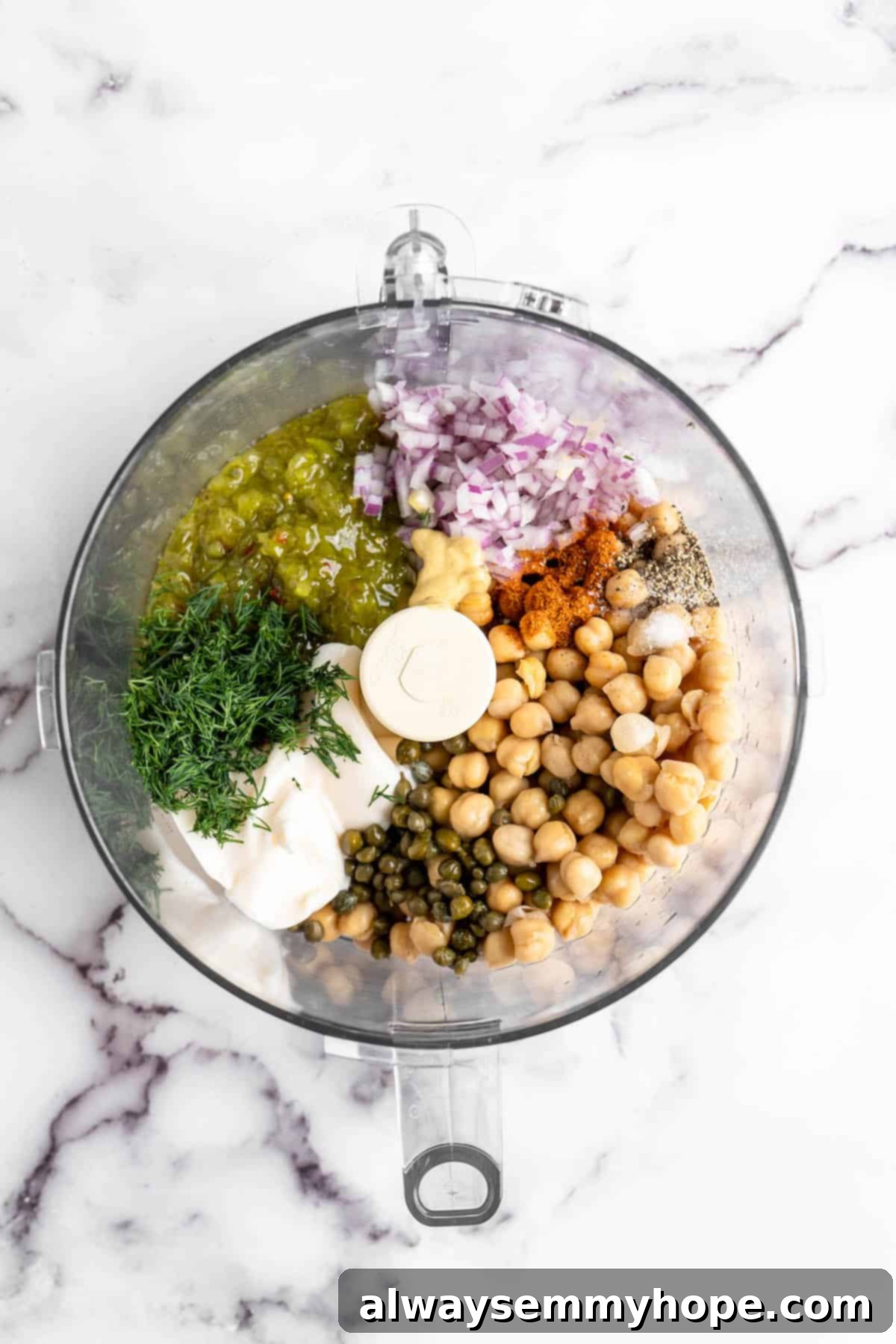 Creamy Vegan Chickpea Tuna Salad 4 Overhead view of vegan tuna ingredients in food processor bowl