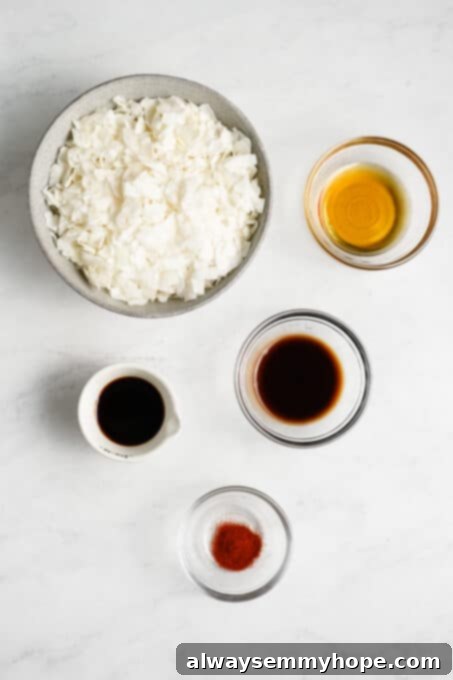Ingredients for making homemade coconut bacon, including coconut flakes and various liquids.