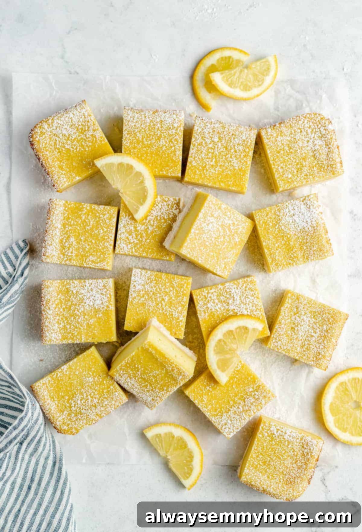 Vegan lemon squares dusted with powdered sugar, ready for serving.