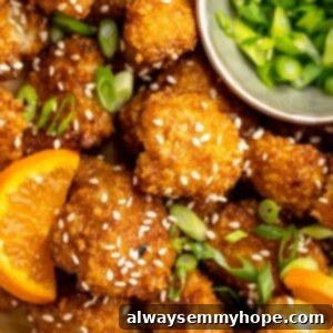Golden Cauliflower 2 Overhead view of crispy orange cauliflower with bowl of scallions