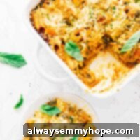 Creamy Vegan Cheese Pasta Bake 7 Overhead view of vegan cheese pasta bake on a white plate and in a white baking dish.