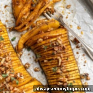 Garlic Herb Hasselback Butternut Squash 2 Overhead view of hasselback butternut squash with fork