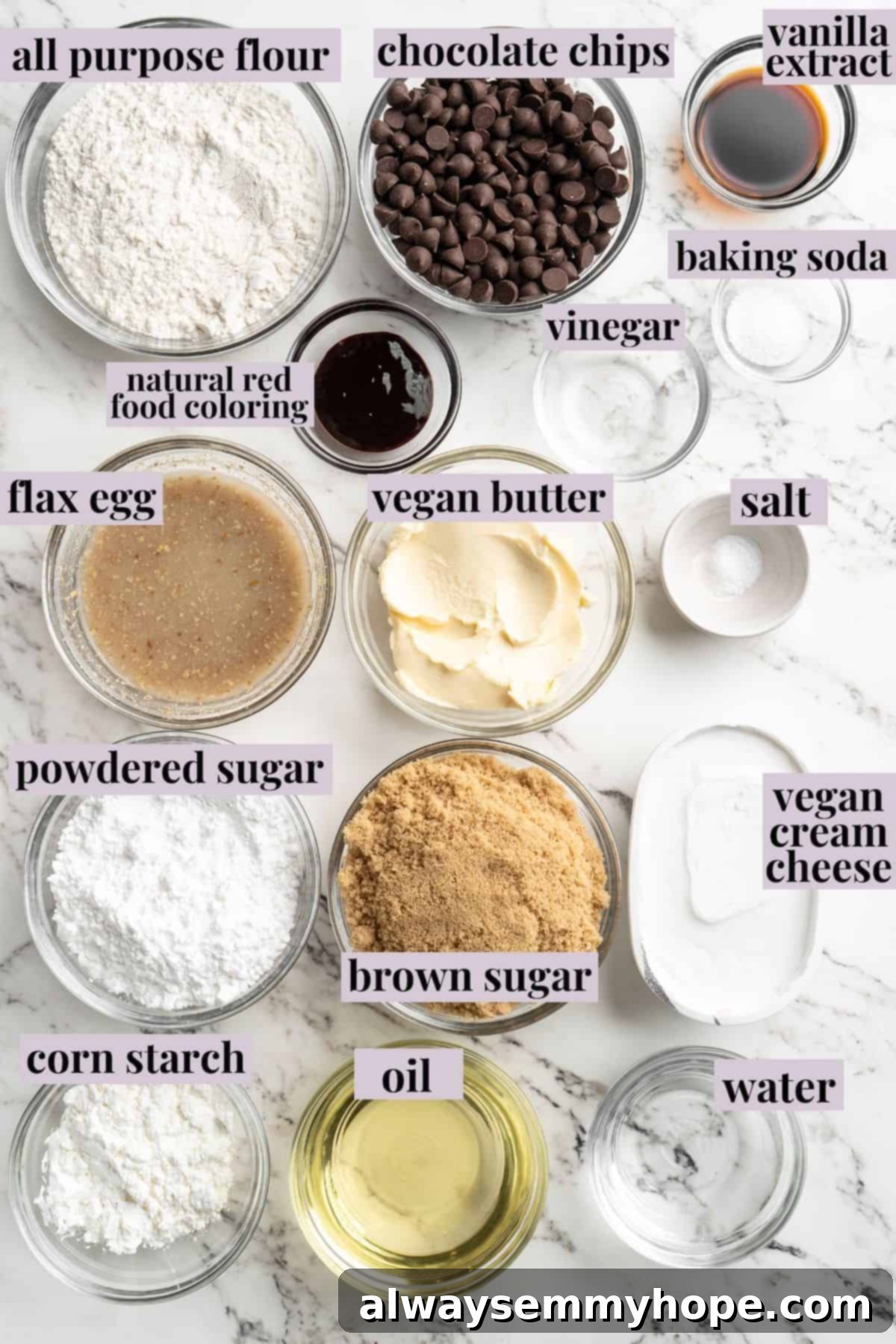 Moist, rich red velvet brownies are perfect for a special occasion or anytime you’re craving a decadent dessert. With cream cheese frosting! Overhead view of all the measured ingredients for vegan red velvet brownies laid out in separate bowls with labels for clarity.