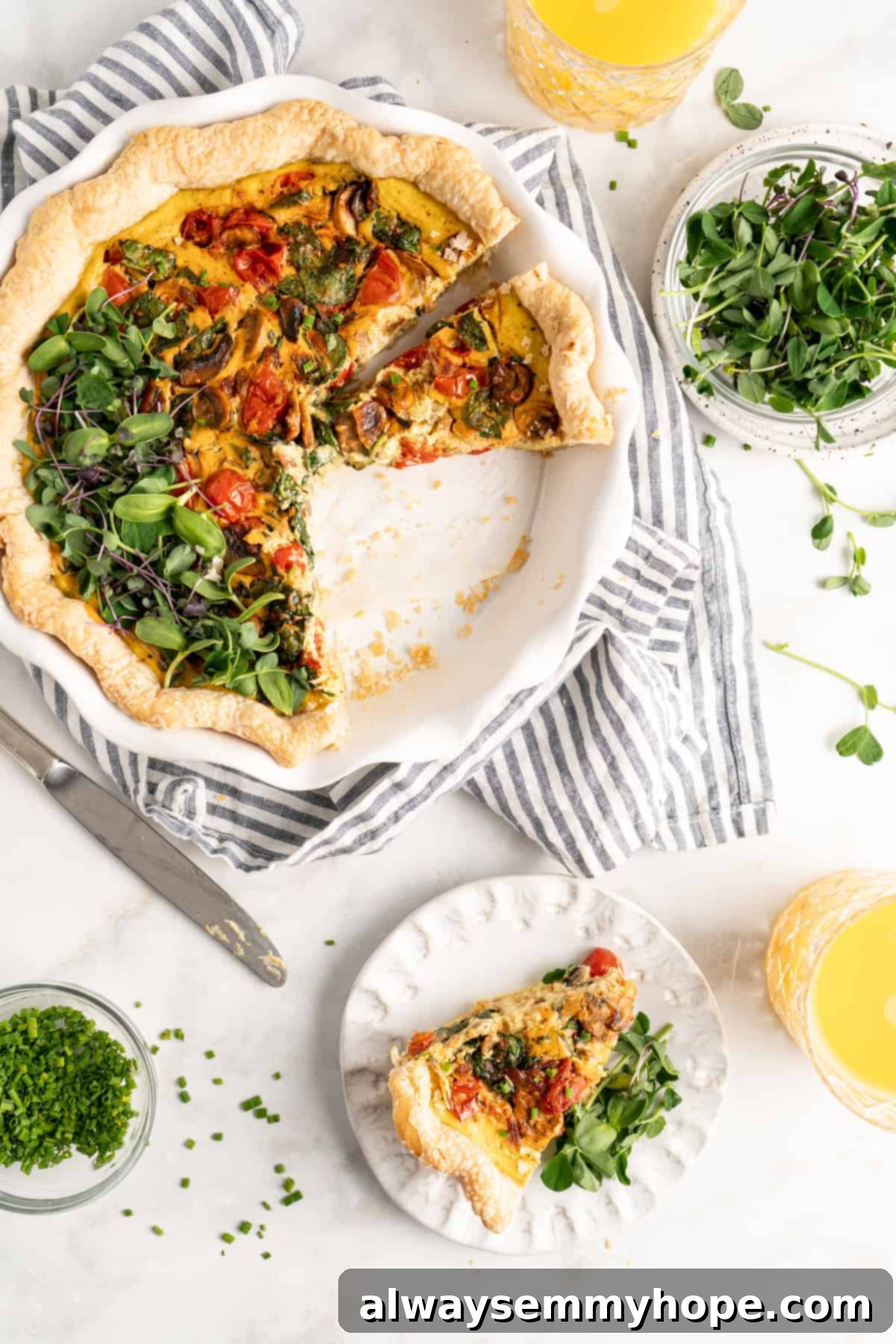 An inviting overhead view of a freshly baked vegan quiche in its dish, with one perfect slice carefully plated next to it, showcasing its golden crust and flavorful filling.