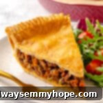 Slice of vegan tourtière on plate