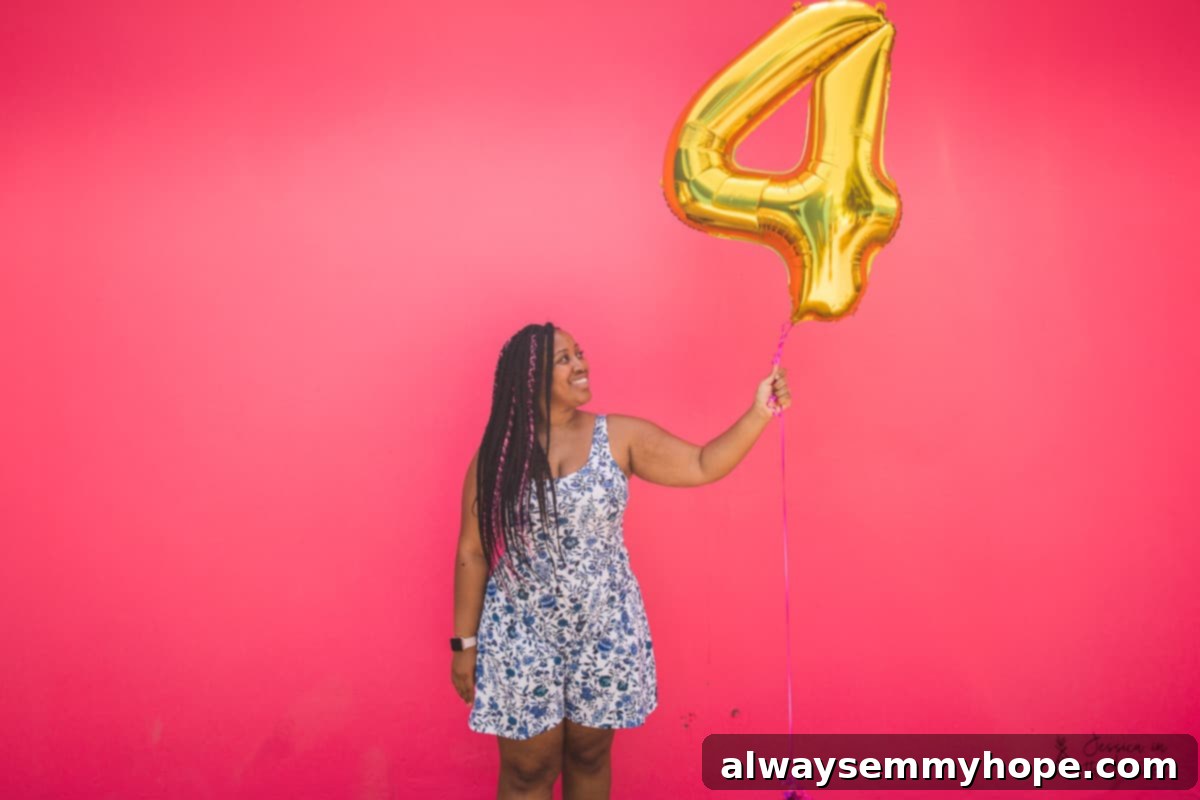 Out of the Kitchen: Holiday Moments, Year-End Mindset & My Guiding Word for 2019 3 Jessica holding up a number four balloon.