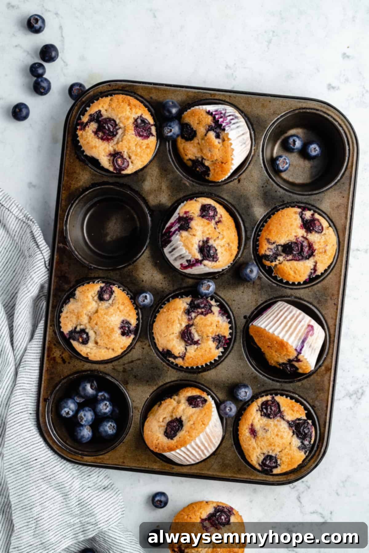 What is cassava flour? And how can you use it in gluten-free baking? I break down everything you need to know about cassava flour. Blueberry muffins and blueberries in a muffin pan.