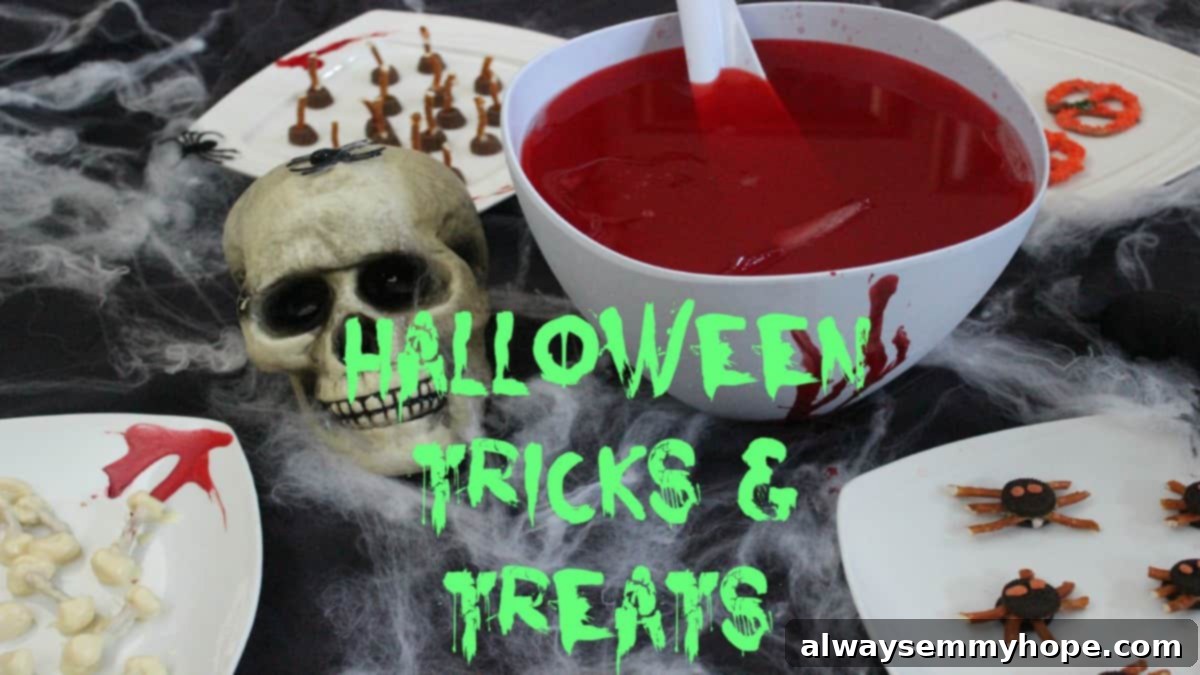 DIY Halloween Treats & Snacks on a black table.