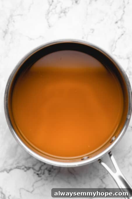 Pan with vegetable broth in it.