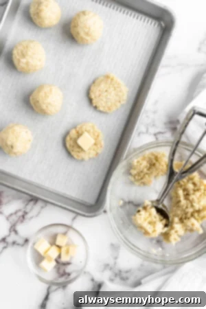 These vegan arancini are crispy, stuffed with melty mozzarella, and perfect for appetisers! Fry them the traditional way or use an air fryer! Overhead view showing process of forming vegan arancini