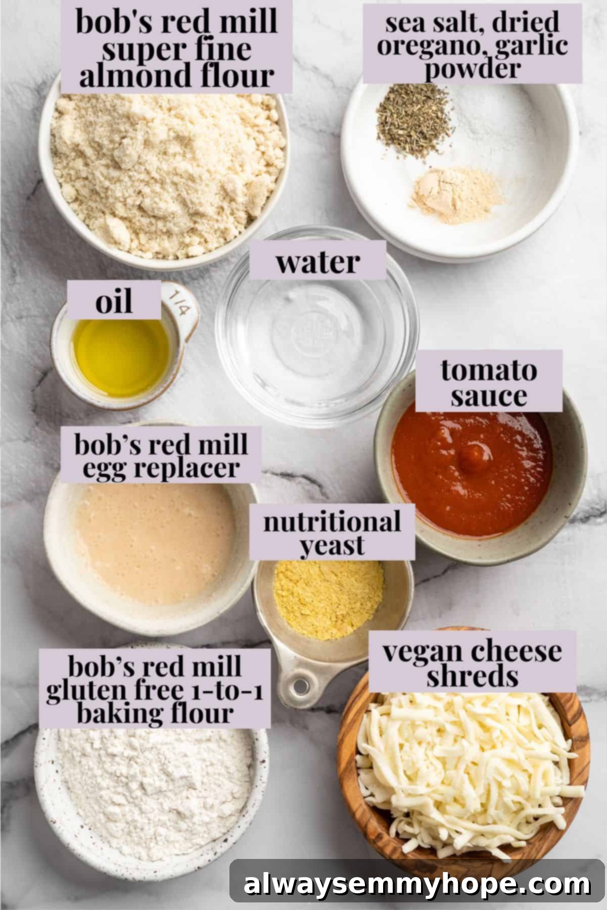 Overhead view of all the simple ingredients required for making the almond flour pizza crust, neatly arranged.