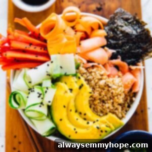 A vegan sushi rice bowl on a wooden board.