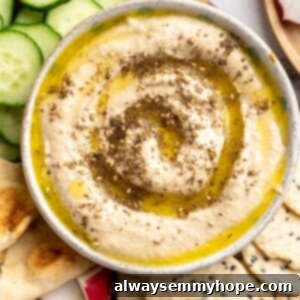 Creamy Roasted Cauliflower Hummus 2 Overhead view of roasted cauliflower hummus with olive oil and za'atar