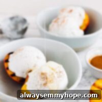 Sweet & Smoky Peaches, Cool Coconut Bliss 2 Grilled peaches and coconut ice cream in a bowl with maple syrup drizzled on top.