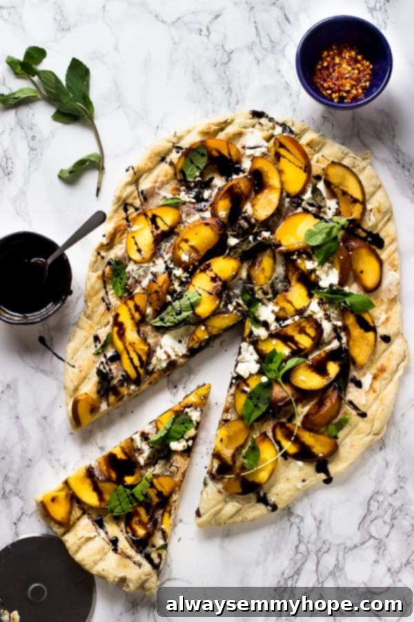 Sizzling Summer: 10 Vegan Grill Ideas 8 Grilled peach pizza with a slight taken out.