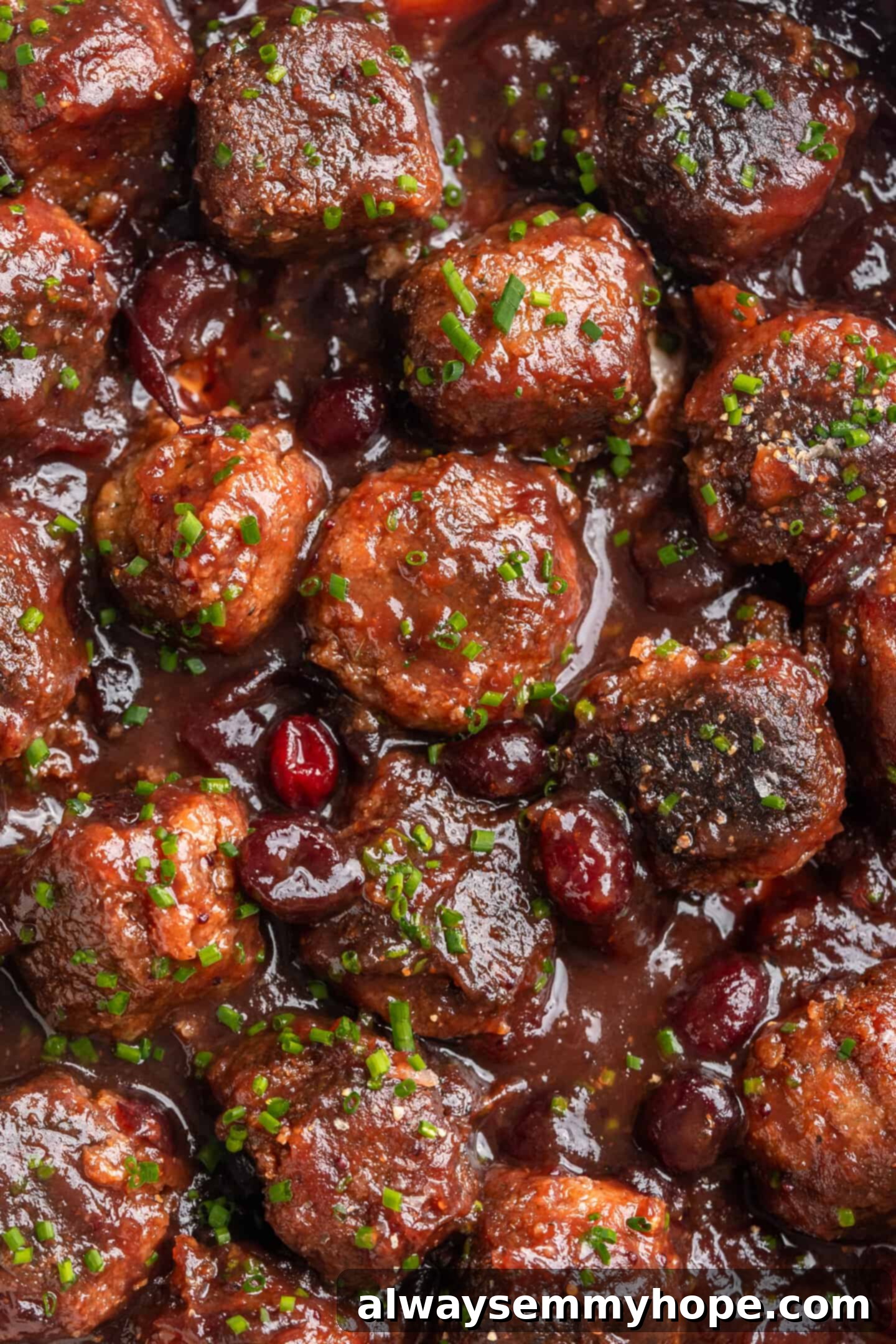 Overhead view of vegan cranberry meatballs in pan