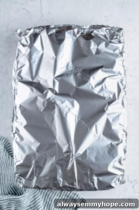 Aluminum foil covering a baking dish.