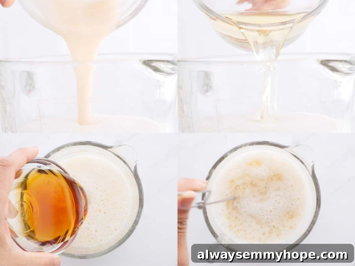 A whisk stirring wet ingredients in a bowl, showing the texture of the vegan cornbread batter.