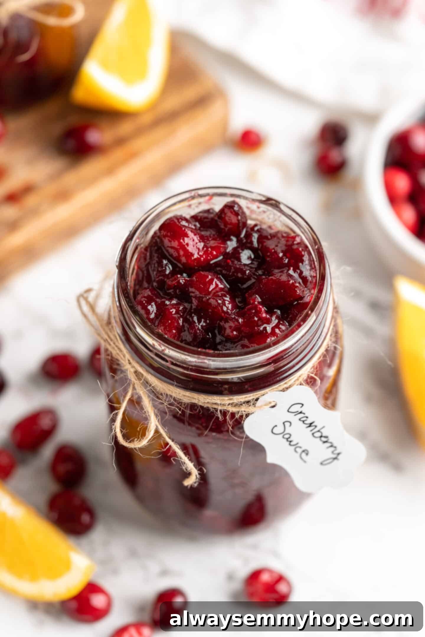 Cranberry sauce in jar with tag