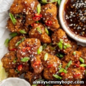 Platter of General Tso cauliflower with bowl of sauce