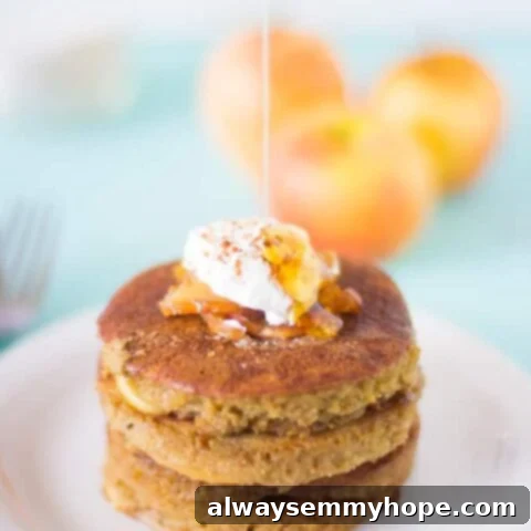 80+ Vegan Thanksgiving Feast Recipes 15 A stack of healthy, gluten-free apple pie pancakes topped with caramelized apples and a dusting of cinnamon.