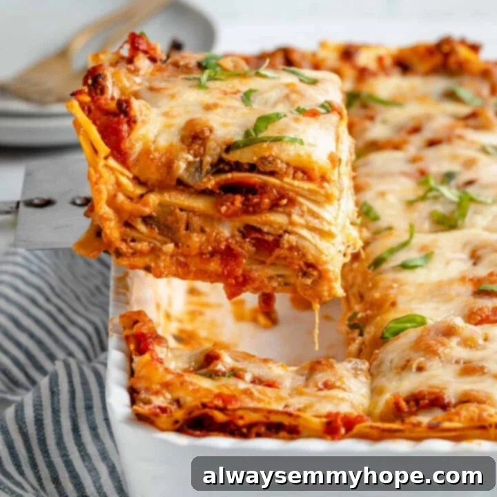 80+ Vegan Thanksgiving Feast Recipes 17 A rich, cheesy baked vegan lasagna, layered with plant-based ricotta and savory sauce, garnished with fresh basil.