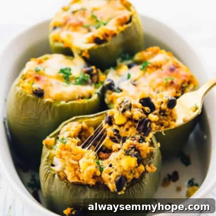80+ Vegan Thanksgiving Feast Recipes 25 Vibrant Tex-Mex style quinoa stuffed peppers, baked until tender and filled with a colorful, savory quinoa mixture.