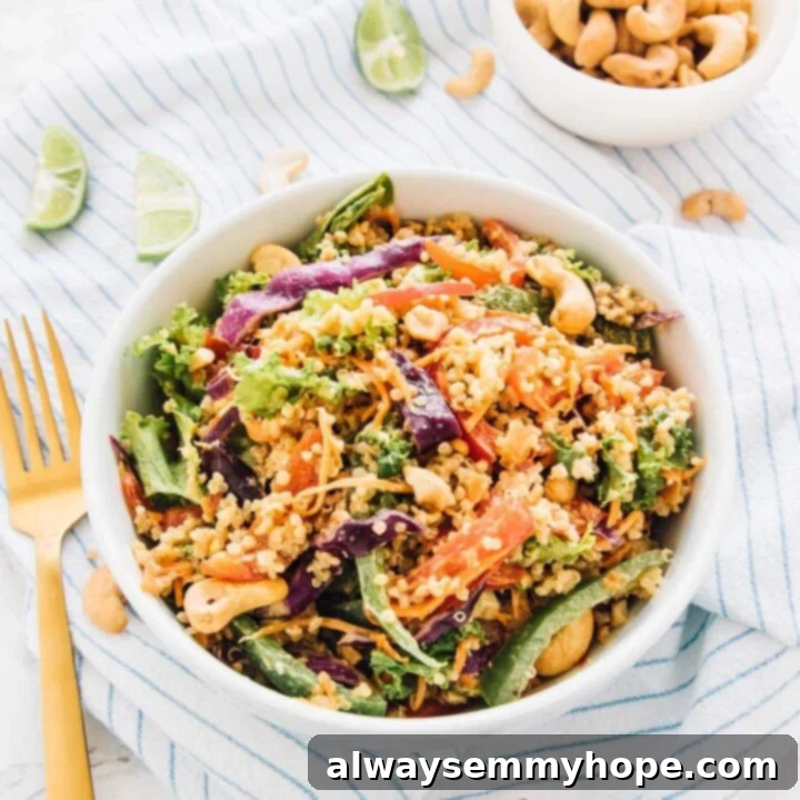 80+ Vegan Thanksgiving Feast Recipes 29 A colorful cashew Thai quinoa salad dressed with a rich peanut ginger sauce, featuring fresh vegetables and cashews.