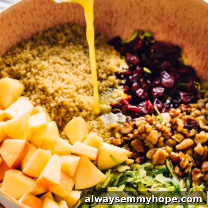 80+ Vegan Thanksgiving Feast Recipes 32 A vibrant shaved Brussels sprouts, quinoa, and apple salad, drizzled with a sweet orange vinaigrette.