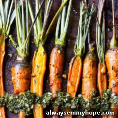 80+ Vegan Thanksgiving Feast Recipes 55 Vibrant maple garlic roasted carrots with a fresh carrot greens chimichurri, a unique and flavorful side dish.