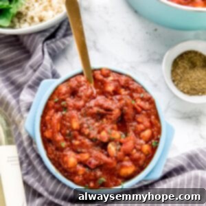 Velvety Smoked White Beans in Tomato Garlic Sauce 6 Top down shot of garlic tomato sauce in a pot.