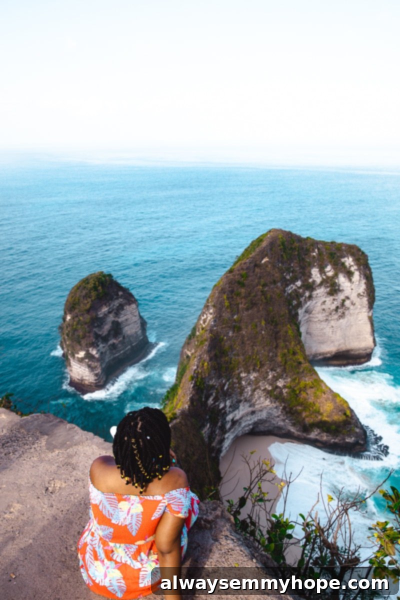Jessica sat on a cliff edge, overlooking the sea. 