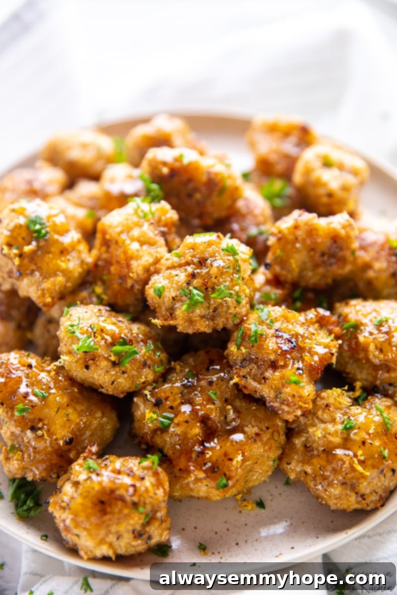 A batch of lemon pepper cauliflower wings on a plate. 