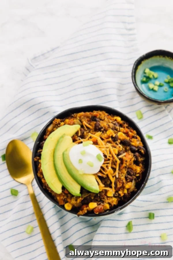 Score Big with 30 Vegan Super Bowl Recipes 30 Hearty Vegan Crockpot Chili with black beans and quinoa, topped with fresh cilantro.