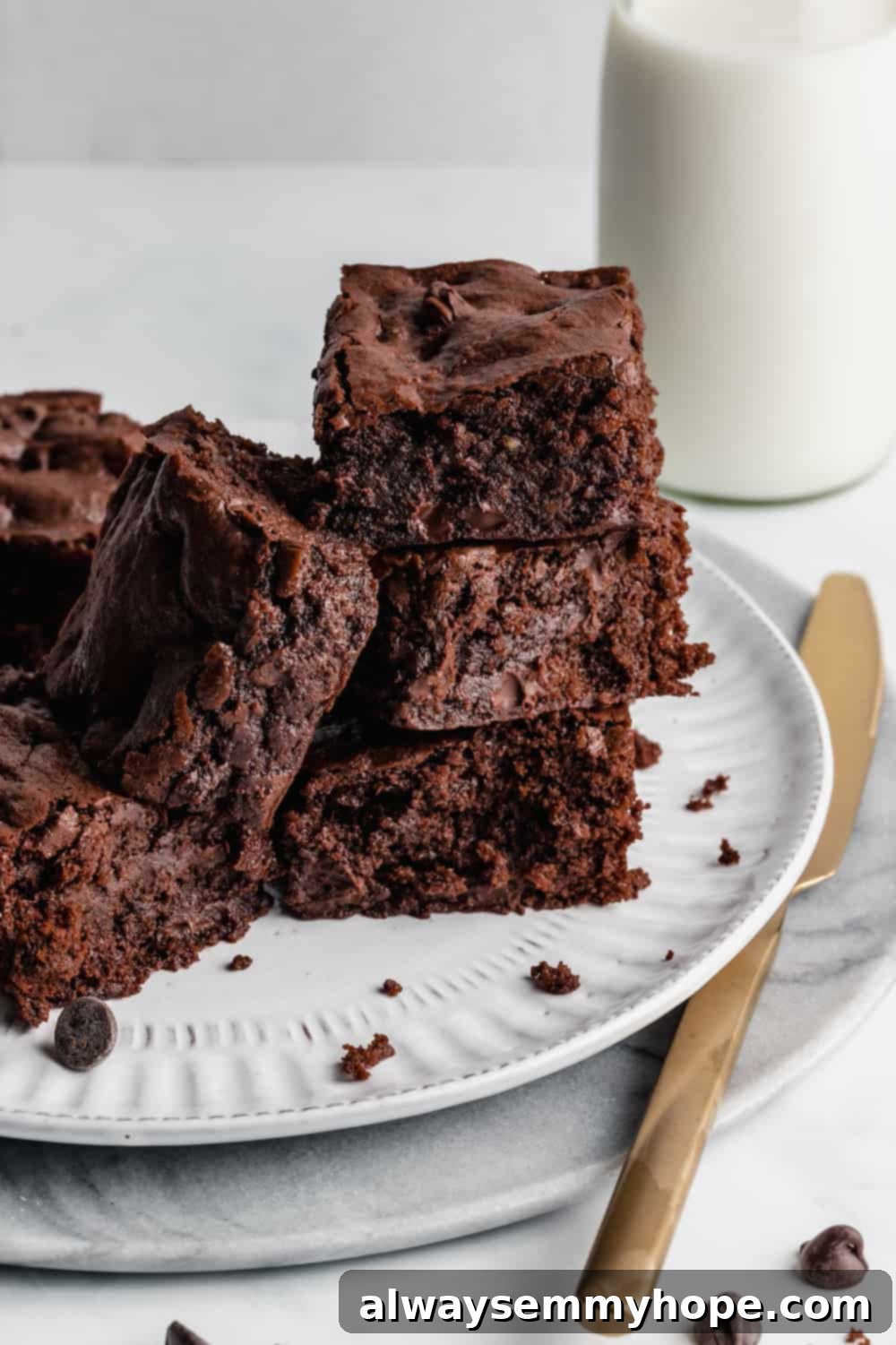 Score Big with 30 Vegan Super Bowl Recipes 33 Decadent Fudgy Vegan Brownies topped with chocolate chips.