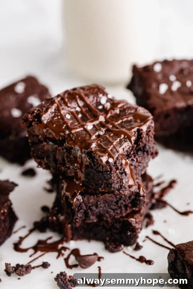 One Bowl Fudgy Vegan Gluten Free Almond Flour Brownies 5 Two rich vegan Almond Flour Brownies perfectly stacked.