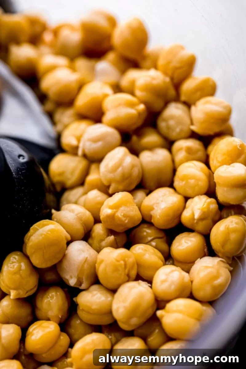 The Ultimate Homemade Hummus 3 Close up of chickpeas in a food processor