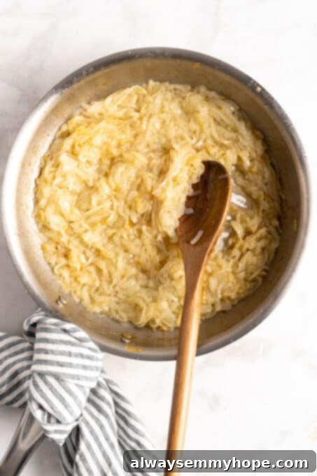 Learn how to caramelize onions the right way for sweet, deeply browned, jammy onions to add to your favorite meals and recipes! Golden-colored onions continuing to cook and soften in a skillet