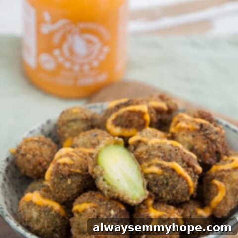 25 Festive Vegan Recipes for St. Patrick's Day 18 Crispy Fried Brussels Sprouts served in a bowl.