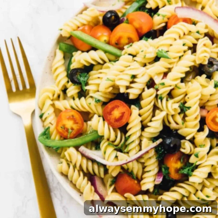 Fresh and colorful 15-Minute Vegan Pasta Salad in a large bowl, ready for serving.