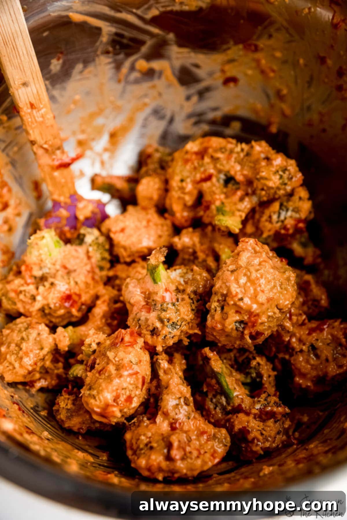 Dynamite Vegan Broccoli 4 Cooked broccoli recently tossed in bang bang sauce.