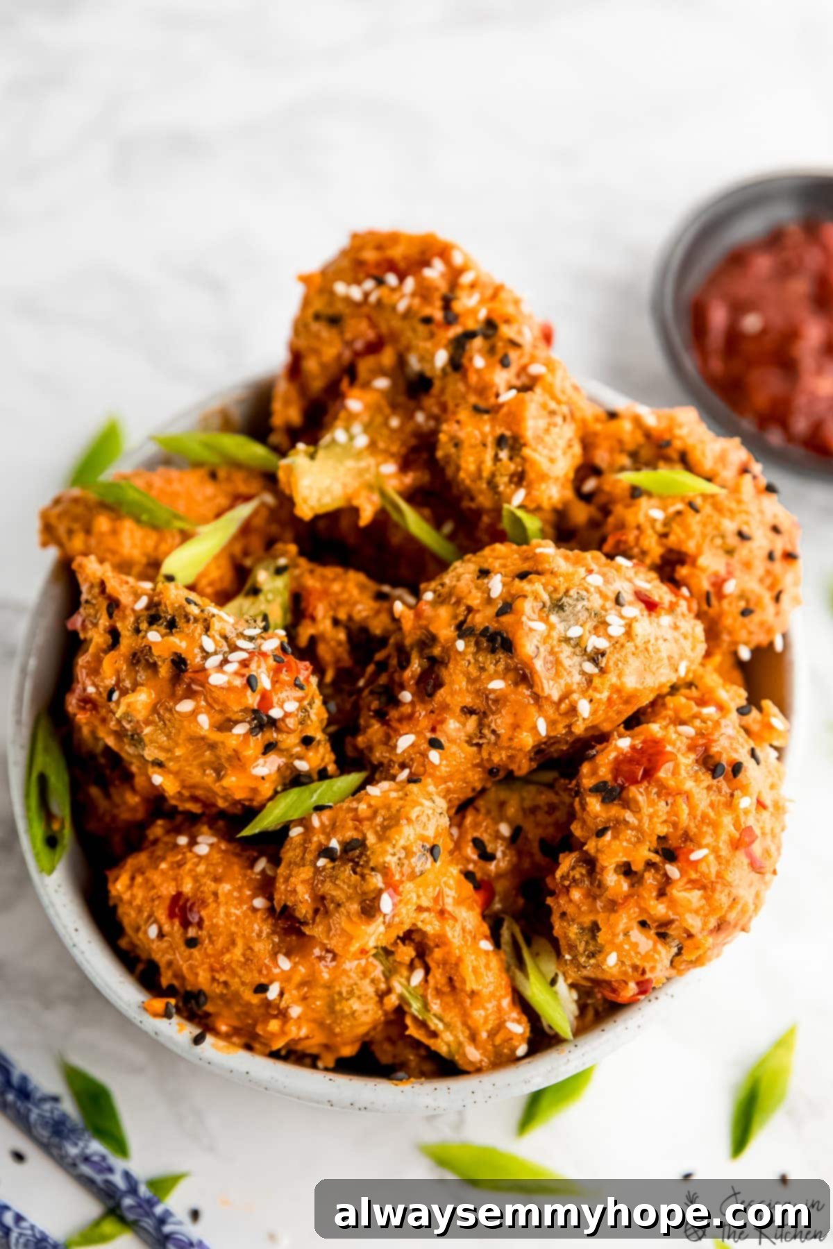 Dynamite Vegan Broccoli 5 Bang bang broccoli in a bowl, bird's eye view.