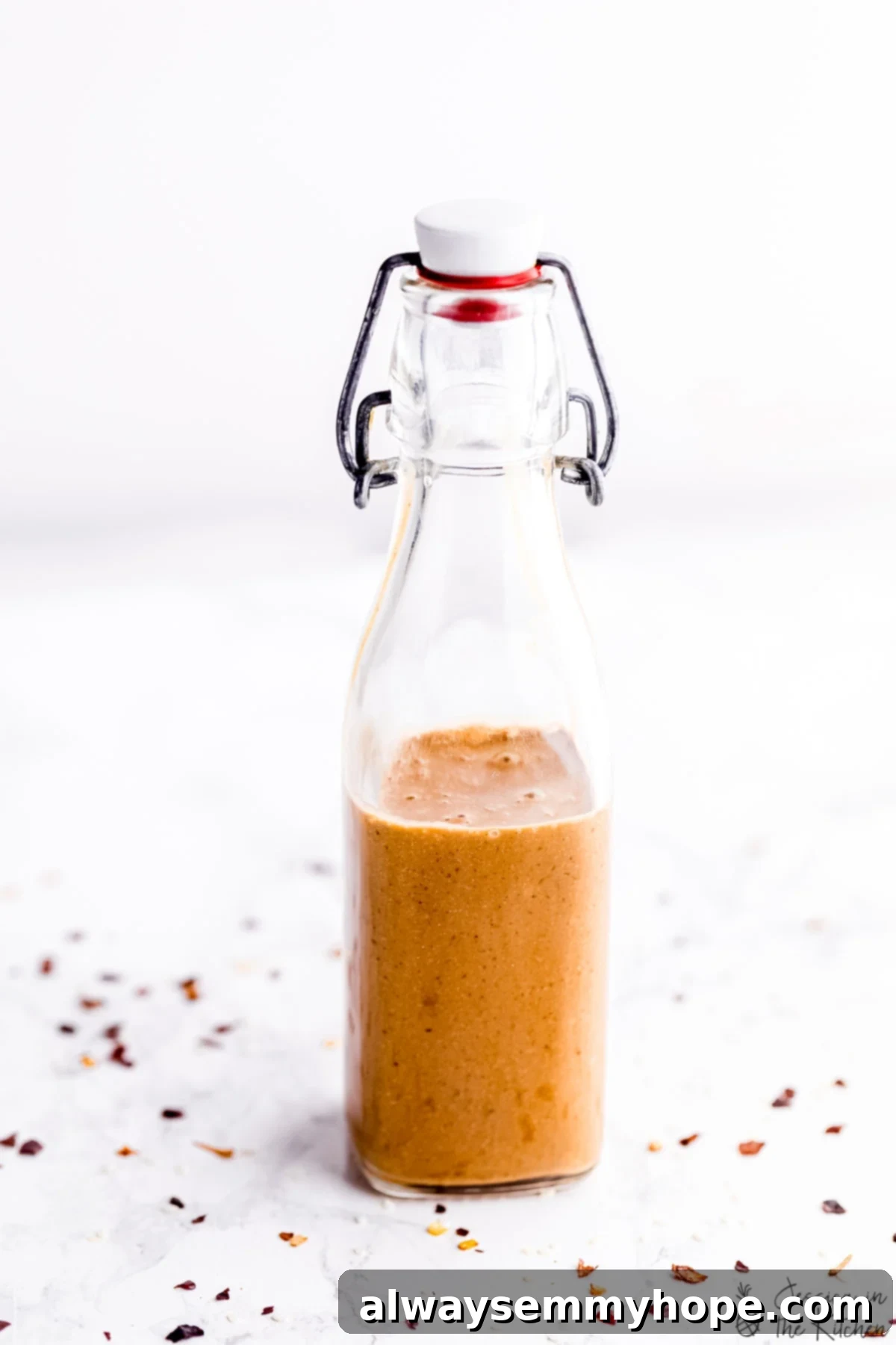 Creamy Thai Peanut Sauce 5 Thai peanut sauce in a sauce bottle.